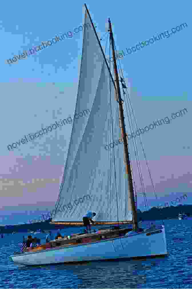 A Catboat Sailing On The Open Water Penelope Down East: Cruising Adventures In An Engineless Catboat Along The World S Most Beautiful Coast