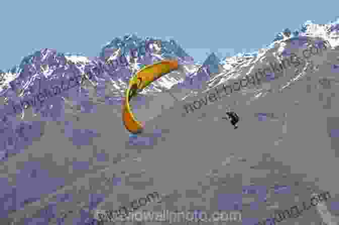 A Person Paragliding Over The Mountains Of The South Island, New Zealand Lonely Planet New Zealand S South Island Road Trips (Travel Guide)