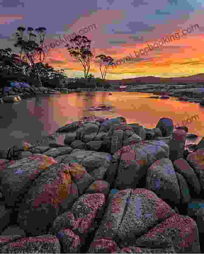 A Photographer Capturing A Sunset In Tasmania Undiscovered Tasmania: A Locals Guide To Finding Adventure