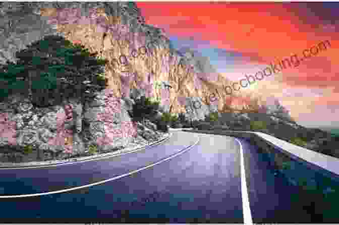 A Scenic View Of A Winding Road Leading Through A Vibrant Landscape, Framed By Majestic Mountains And A Vast Expanse Of Sky. Discovering Beautiful: On The Road To Somewhere