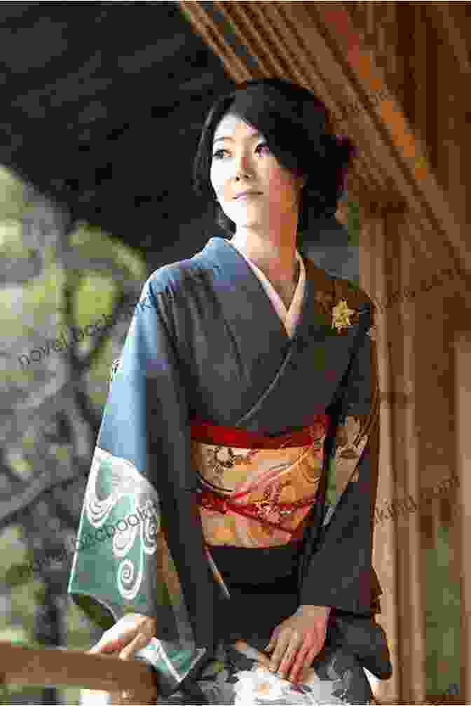 A Woman Wearing A Traditional Japanese Kimono, Showcasing The Country's Rich Cultural Heritage Unbelievable Pictures And Facts About Japan