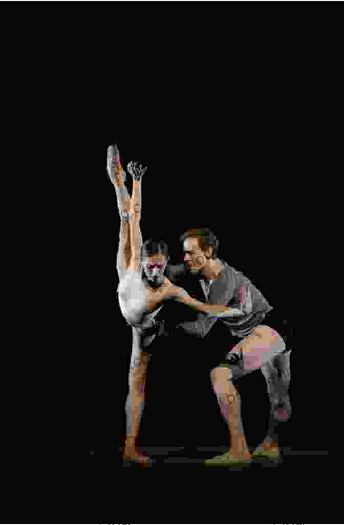 Two Performers Engaged In A Dynamic Dance, Their Bodies Intertwining As They Share A Powerful Narrative Through Their Movement And Spoken Words Choreography And Verbatim Theatre: Dancing Words